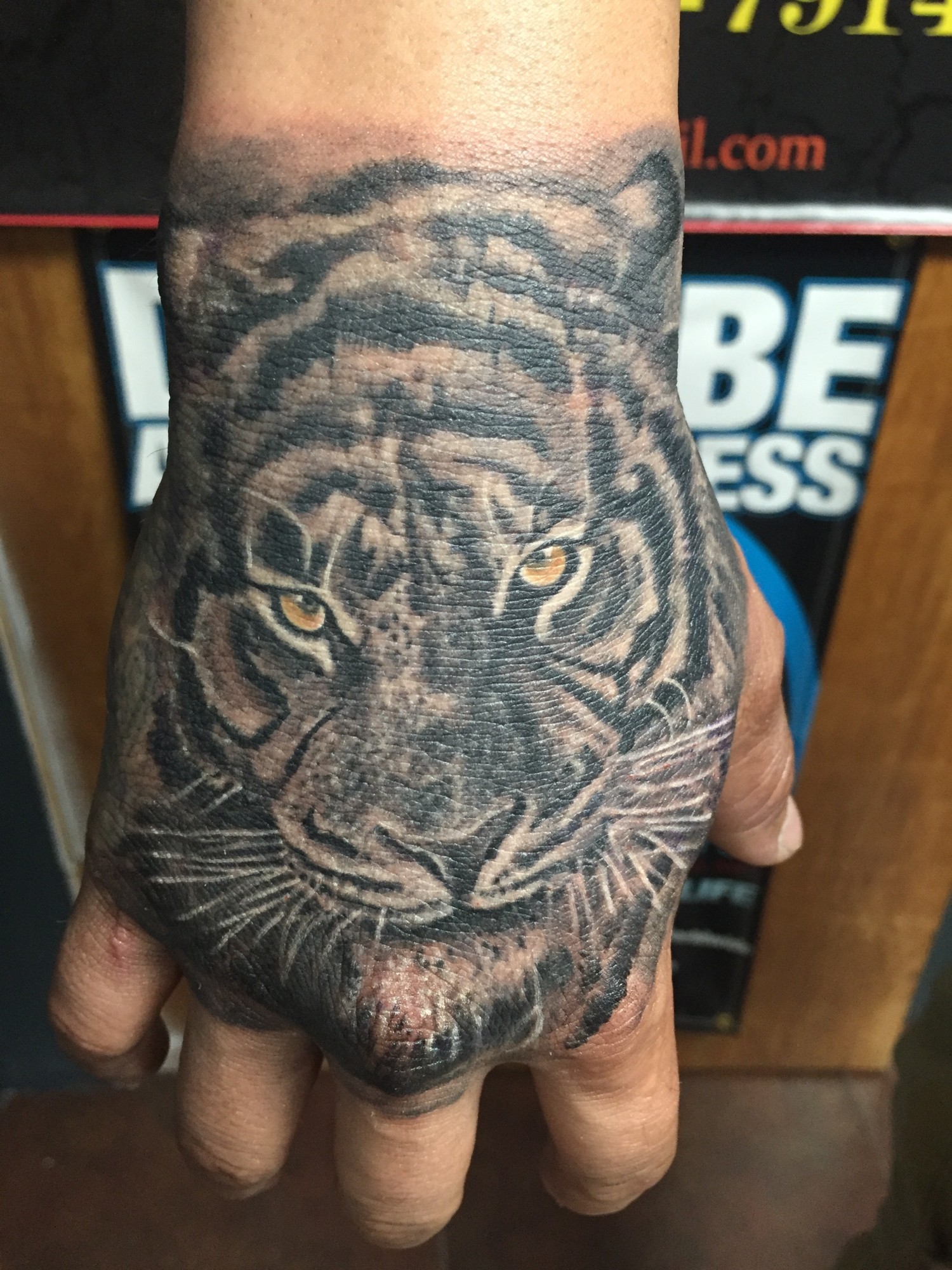 Black and Grey Hand Tattoo 3 - Raw Ink Studio
